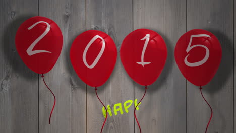 2015 balloons against wooden planks