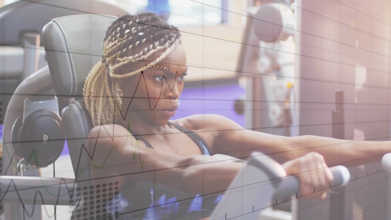 Vertical video: Gripping handles woman in bra pressing chest-press at gym for tone with overlay