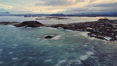 volcanic craters near frozen lake