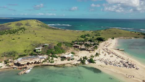 birdseye circle around sunny ilet de pinel beach in saint martin