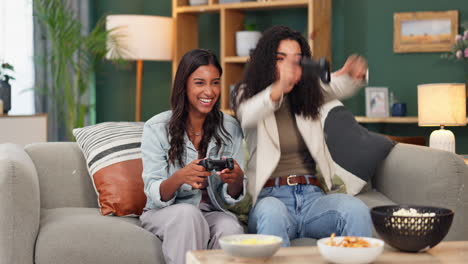 two friends celebrating while playing video games