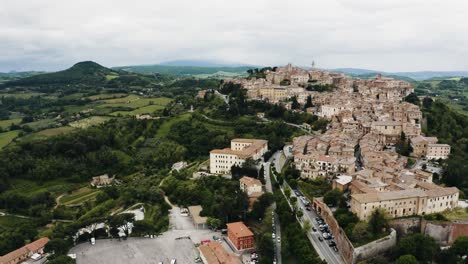 Wide-aerial-view-revealing-the-city-of-Montepulciano,-Tuscany-in-Italy