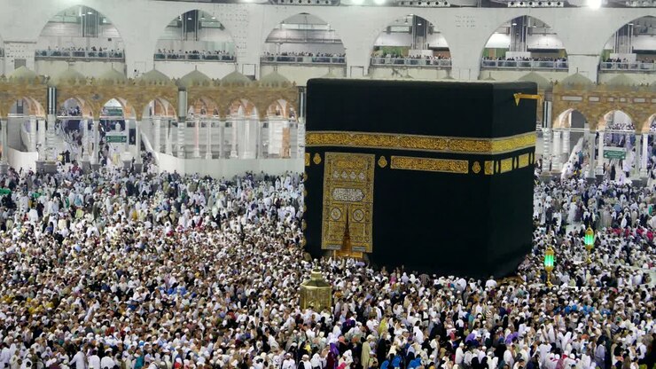 Muslim pilgrims circumambulating the Kaaba in Masjidil Haram, Mecca, Saudi Arabia.