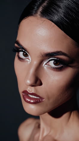 close-up portrait of a woman with dramatic makeup