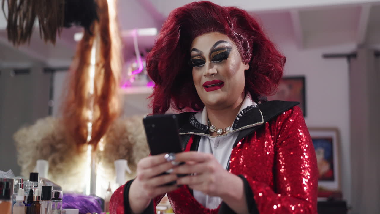 Drag Queen Using Phone