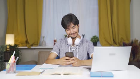 Male-student-chatting-on-the-phone.