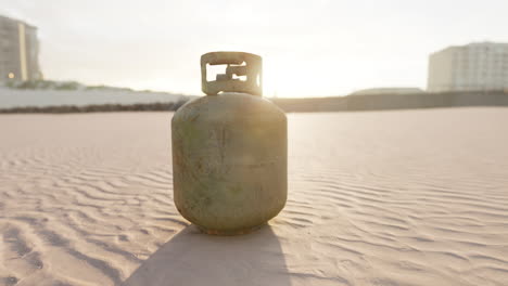 old-rusted-metal-gas-tank-on-the-beach