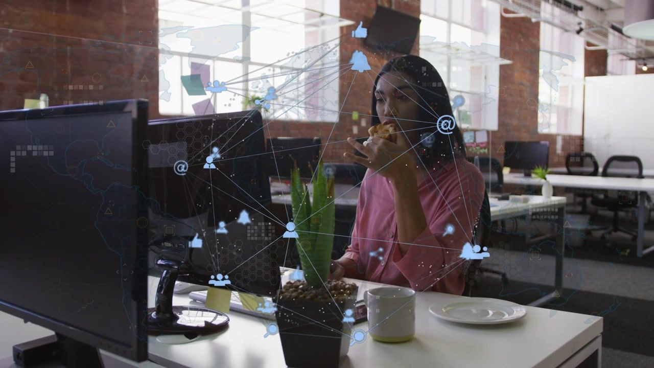 Business woman raising pastry, taking bite while checking screen as social icons animating around
