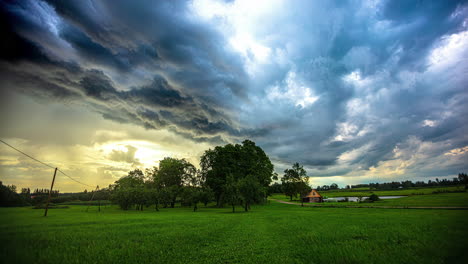 epic cloudscape time lapse of stormy sky and light piercing dark grey and yellow