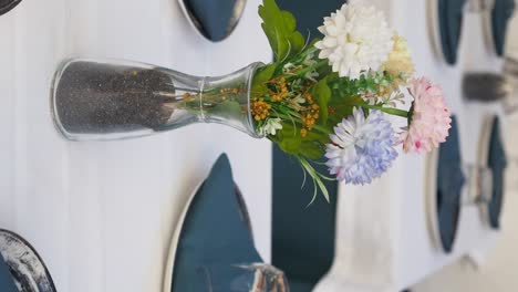 table setting with artificial flowers