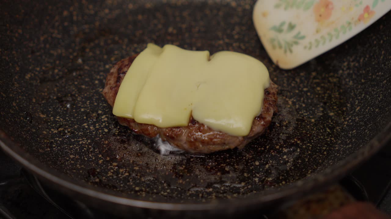 Melting Cheese on a Juicy Burger Patty