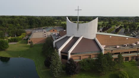 christian church building with cross in america, aerial drone view