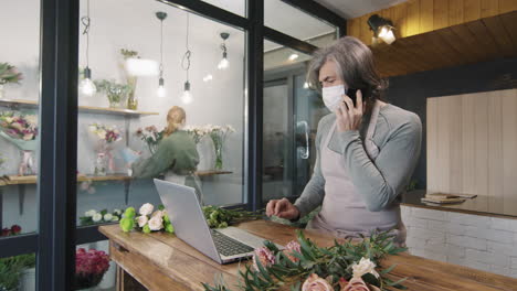 male florist at work during quarantine