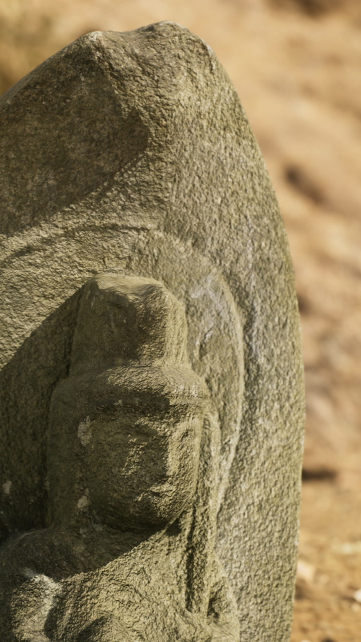 Exploring ancient stone carvings at a historical site in bright sunlight
