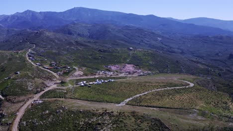 Aerial-View-Of-Moria-Refugee-Camp-In-Lesbos-Island-Near-Mytilene-In-Greece---orbiting-drone-shot