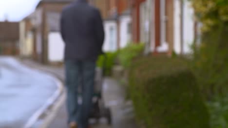 walking with pushchair in street