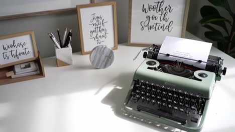 aesthetic vintage typewriter on a modern desk surrounded by stylish decor and inspirational quotes, perfect for creative writing and office spaces