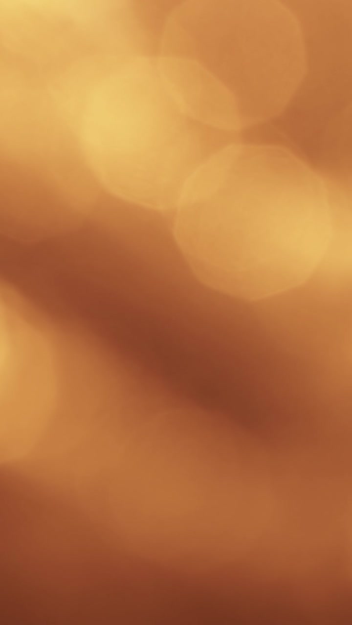 Perdite di Luce Calda Astratte e Sovrapposizione Bokeh