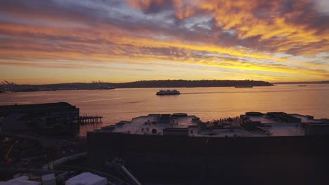 wide shot of ferry in puget sound at sunset