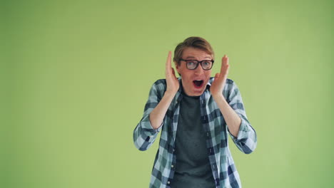surprised man in plaid shirt