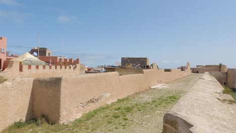 View-from-wall-inside-portuguese-fortress,-wide-panning-shot