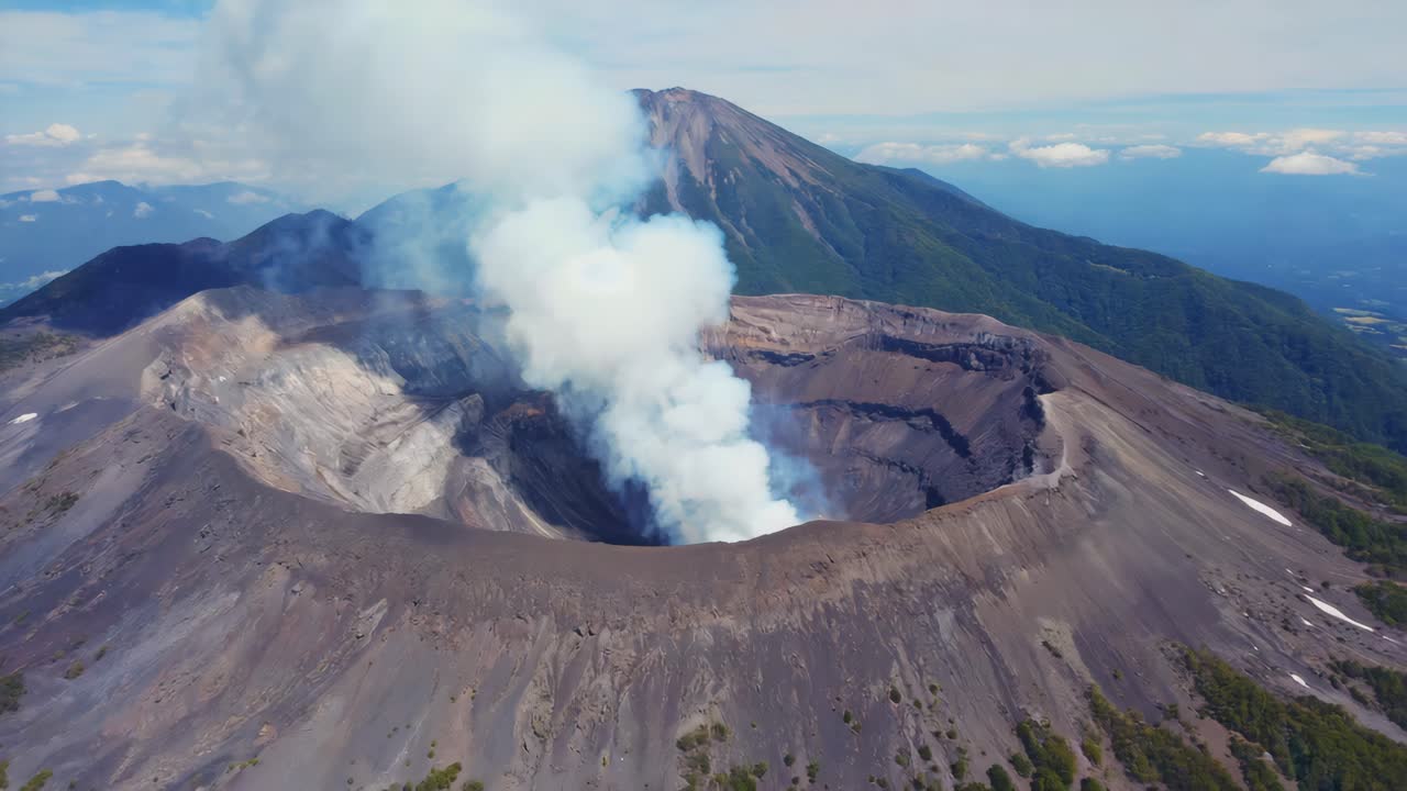 Volcanic crater with smoke rising