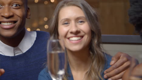 group of friends enjoy night out at rooftop bar shot on r3d