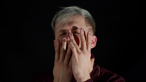 stylish young man with blue eyes looking at camera, posing, feeling happiness, fun, enjoyment