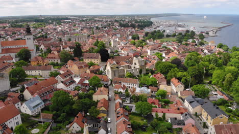 aerial view of town of visby with many houses on coast of gotland island