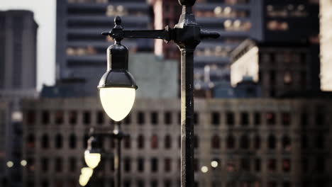 a street light in the middle of a city at night