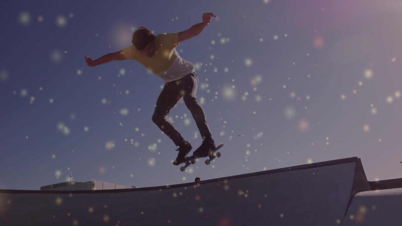 male skateboarder performing aerial trick in skatepark showing sports graphics and bright dots