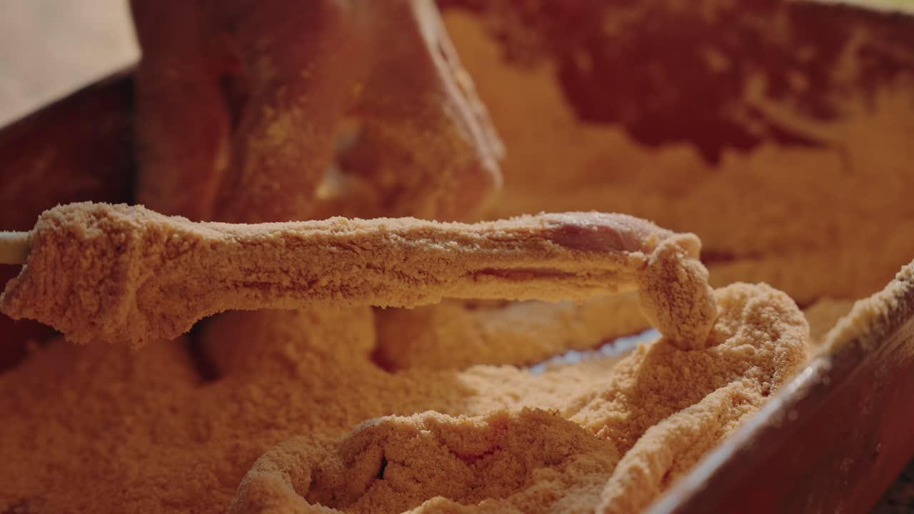 Pork intestines rubbed in flour during traditional prep in Minho region Portugal