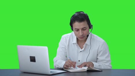 Indian-call-center-employee-explaining-something-to-customer-Green-screen