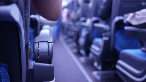 Purple--empty-passenger-airplane-seats-in-the-cabin,