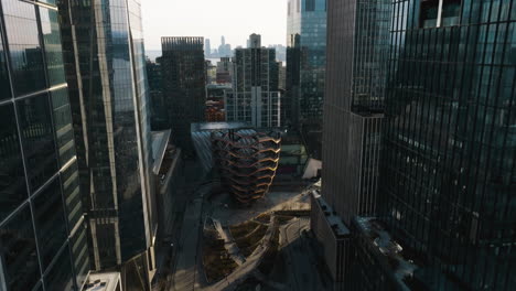 rising in middle of skyscrapers in hudson yards, nyc - ascending, aerial view