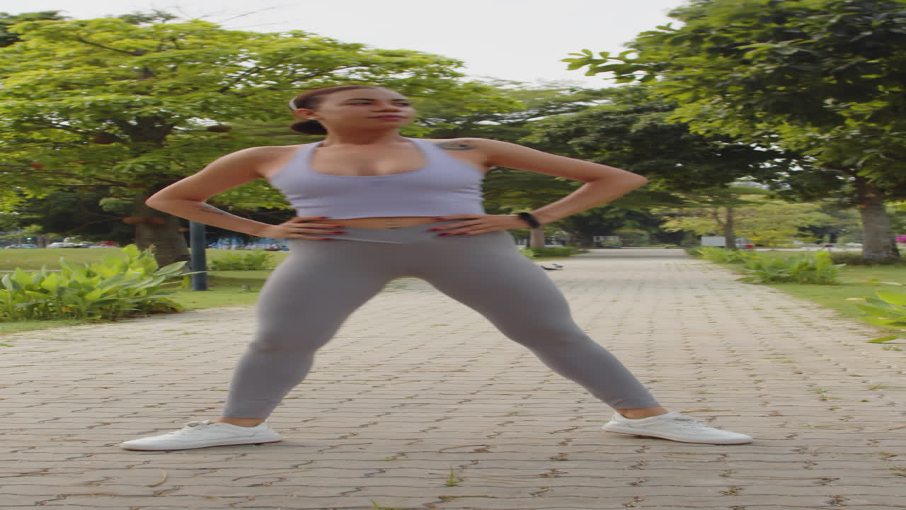 Woman Performing Leg Lunges during Morning Workout