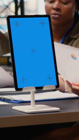 vertical video businesswomen use a copy space display and charts to pitch career vision