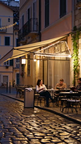 Evening Scene at a Cozy Outdoor Cafe with String Lights