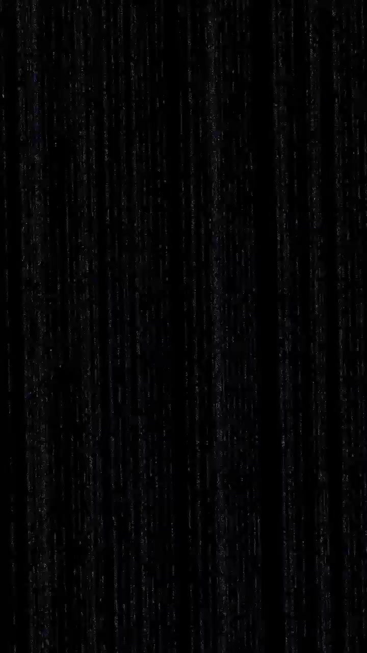 Abstract Background of Vertical Light Streaks on Black Surface