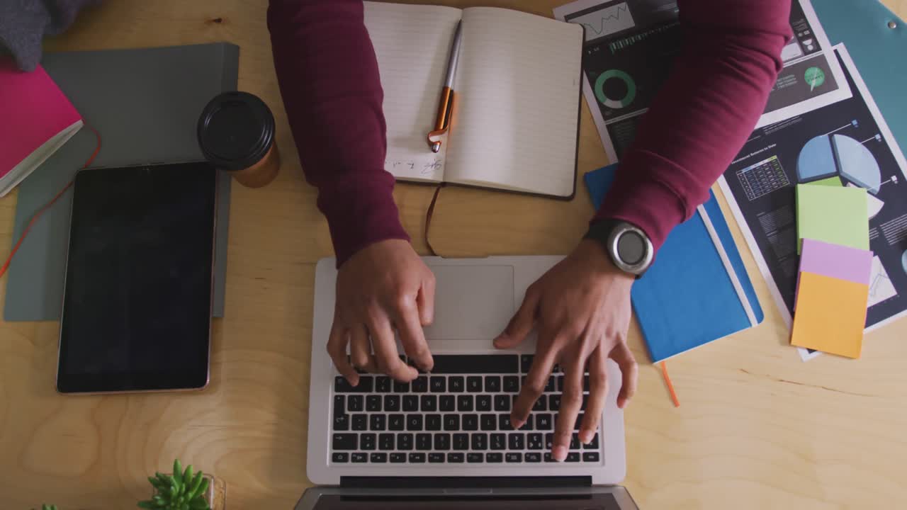 View from above of woman working in creative office