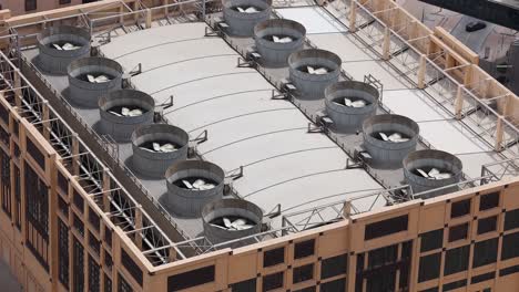 cooling tower fans operating on a building roof