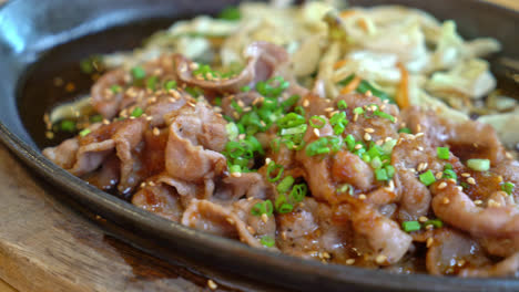 teriyaki pork in hot pan with cabbage - japanese food style