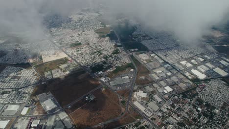 reynosa mexico, view from the clouds of the city's vast buildings and streets