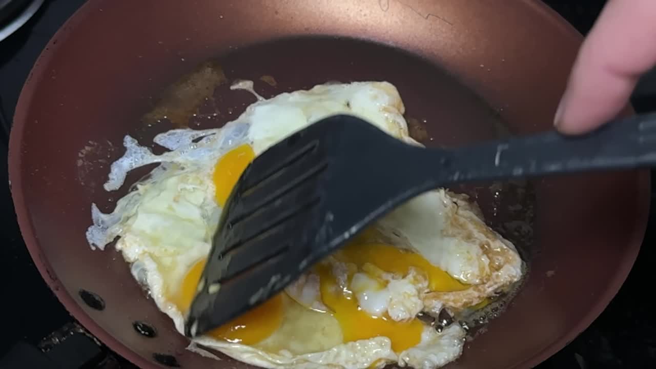 Frying non-stick pan, oil sizzle, delicious gourmet food, slow motion