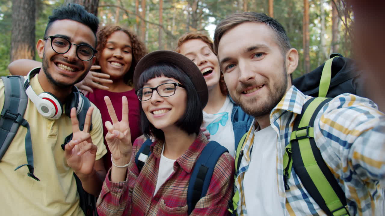 Happy Friends Taking a Selfie in the Forest