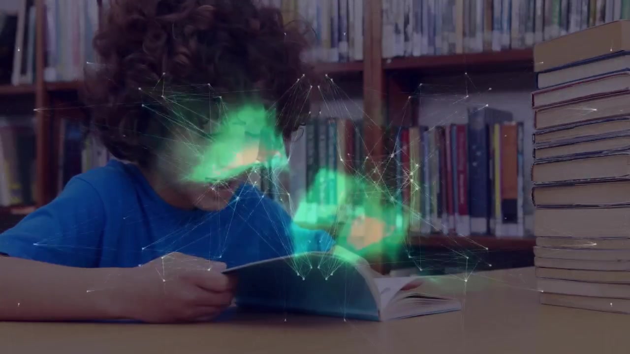 Hologram appearing over book, boy turning pages while network morphing into wings showing story