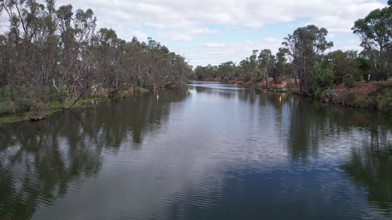 Low drone view over the Loddon River at Bridgewater, central Victoria, Australia, May 2025.