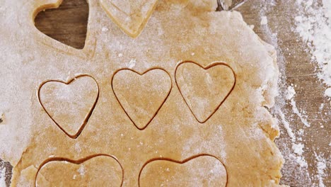 raw cookie dough with heart shaped cookie cutter 4k