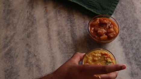 rotation chole bhature or chick pea curry and fried puri served in terracotta crockery over nice background