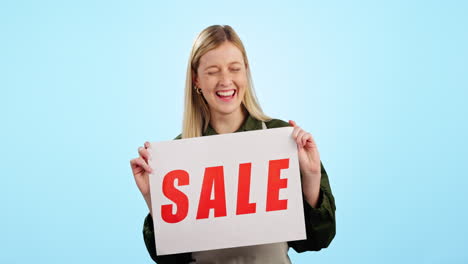 Woman,-sale-sign-and-studio-blue-background